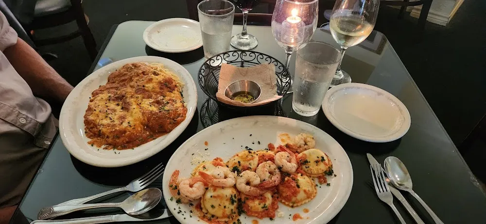 Chicken Parmesan on Left Dinner Special Large Cheese Ravioli w Shrimp
